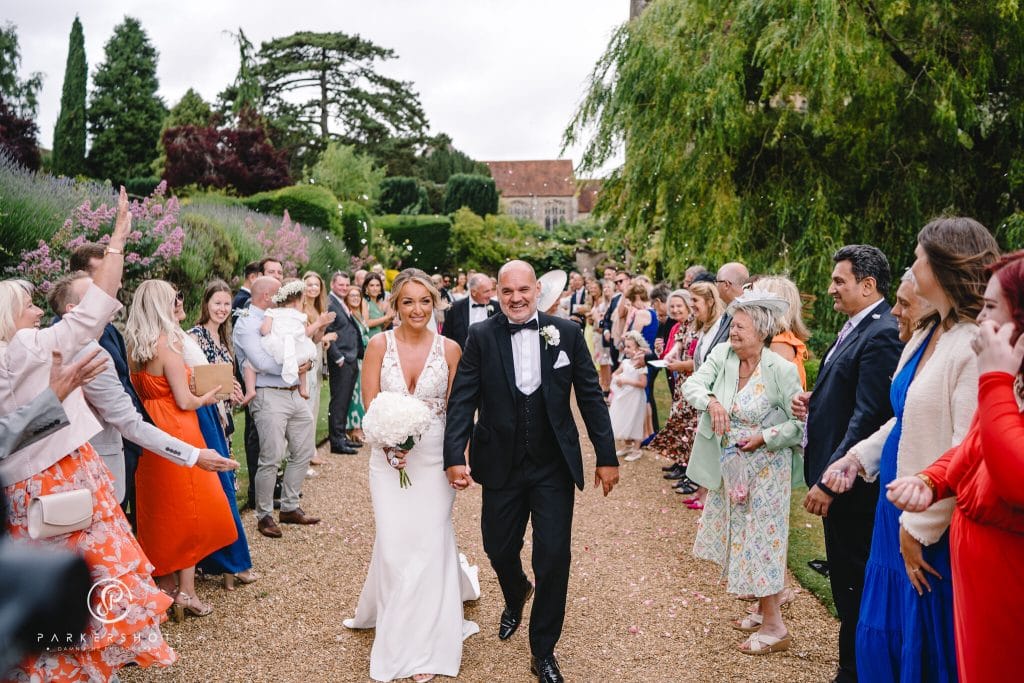 Confetti blessing for the new bride and groom at Nettlestead Place