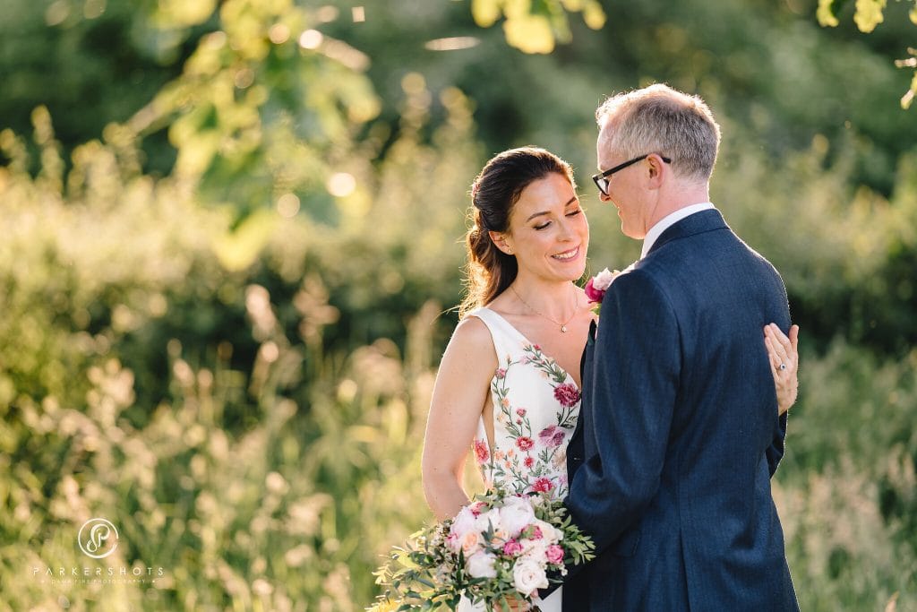Evening portrait of bride and groom at Chafford Park